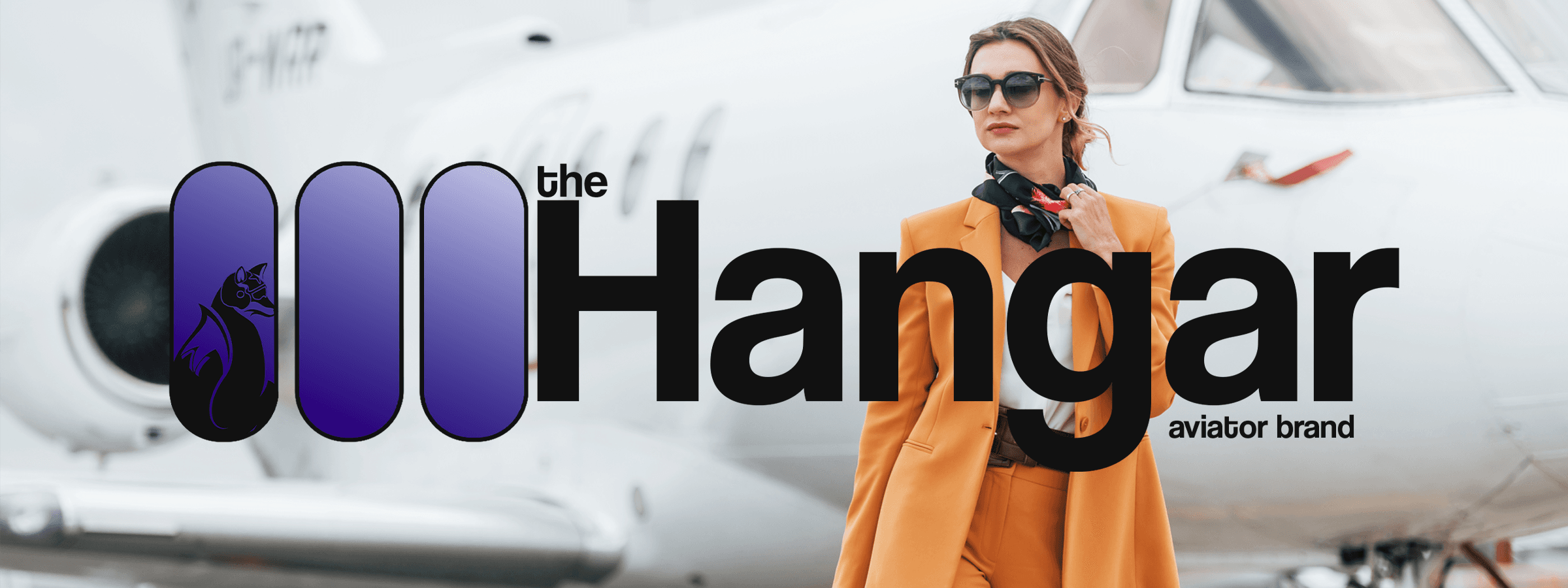 The Hangar Full Logo in Context with airplane and stewardess in the background